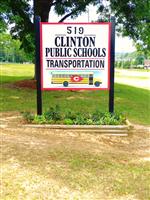 This is an image of the Clinton Public School District transportation sign in the front of the transportation building.